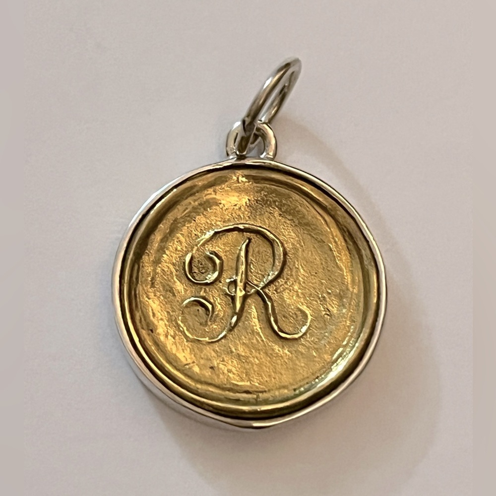 NWOT.  Waxing Poetic sterling silver and brass ‘R’ initial charm.